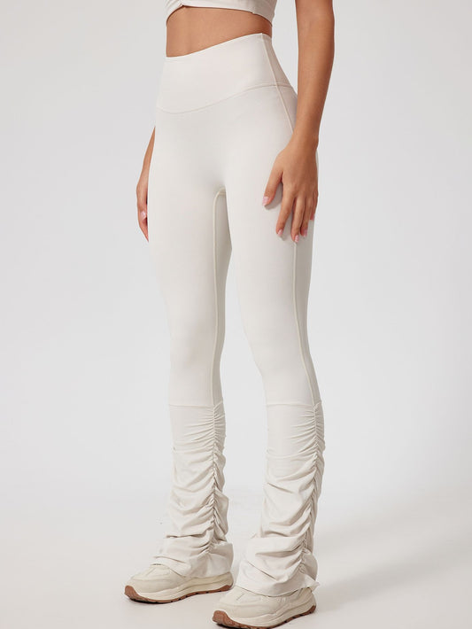 ZASUWA Female Solid Color Flare Folds High-rise Leggings