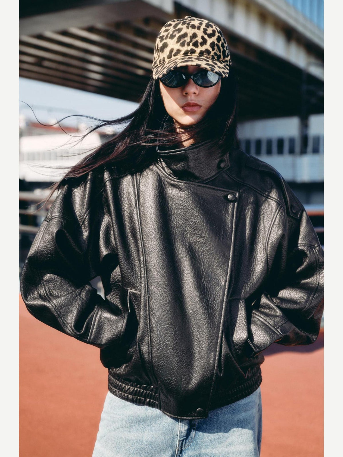 Women's Oversized Faux Leather Bomber Jacket with Asymmetrical Closure