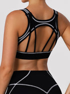 Black Sports Bra with Contrast Piping and Open Back